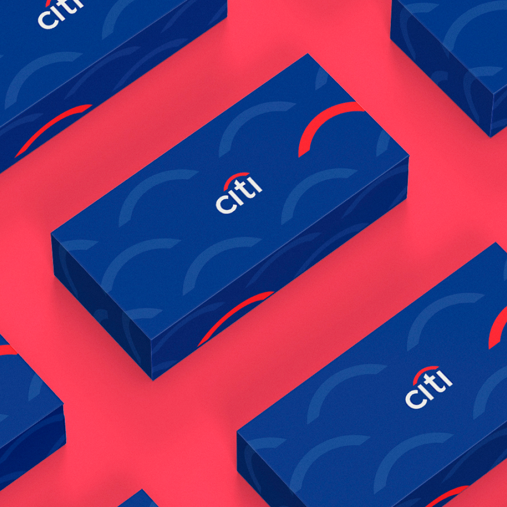 Small Business 7 Blue gift boxes with a pattern of semicircles and the word citi are arranged on a pink surface. Each box features a red arc above the brand name, showcasing an eye-catching design subscription style.